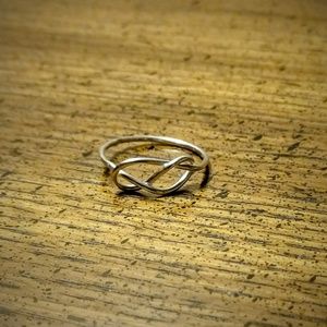 Two silver knot rings